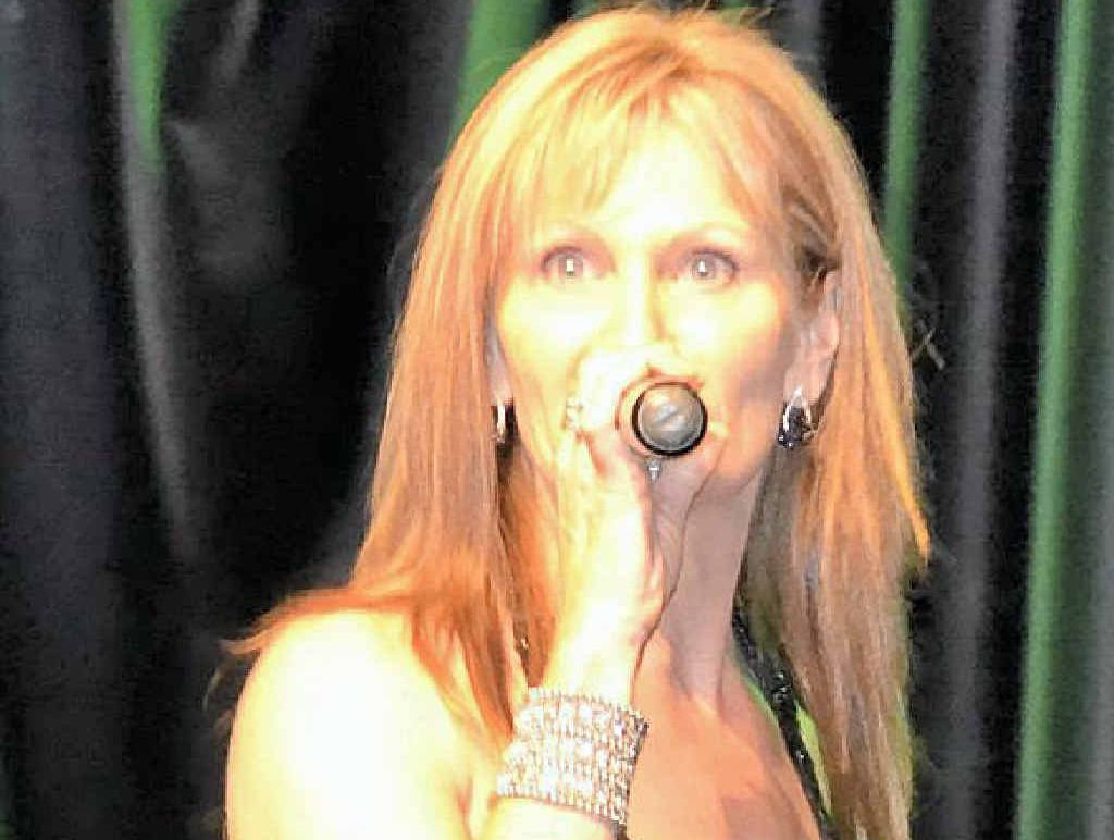 STAGE PRESENCE: Erin Hilton belts out a tune at the Queensland Champion of Champions festival. STAGE PRESENCE: Erin Hilton belts out a tune at the Queensland Champion of Champions festival.